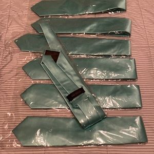 Mens ties. New in packages.